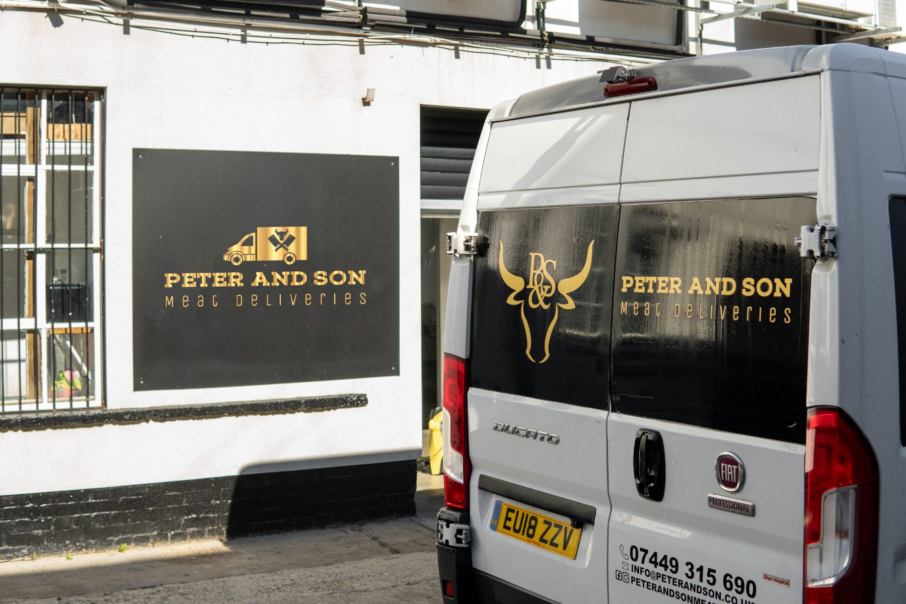 Peter and Son unit sign and van
