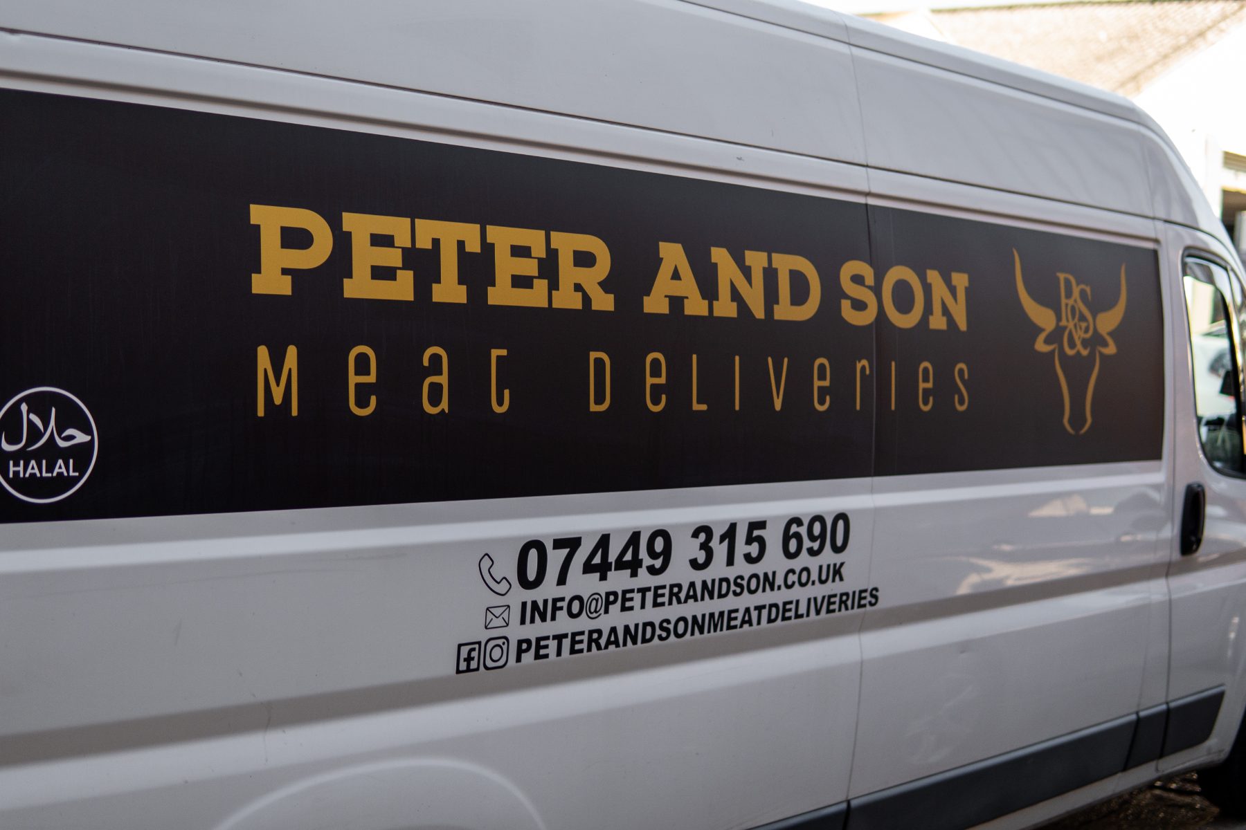 Side of a Peter and Son van